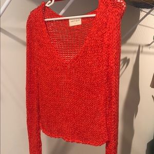Orange knit sweater